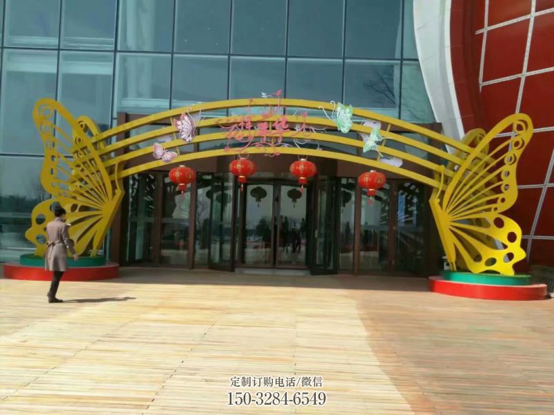 大东蝴蝶拱门雕塑,镂空烤漆效果,不锈钢小区标识雕塑 大东蝴蝶拱门雕塑,镂空烤漆效果,不锈钢小区标识雕塑